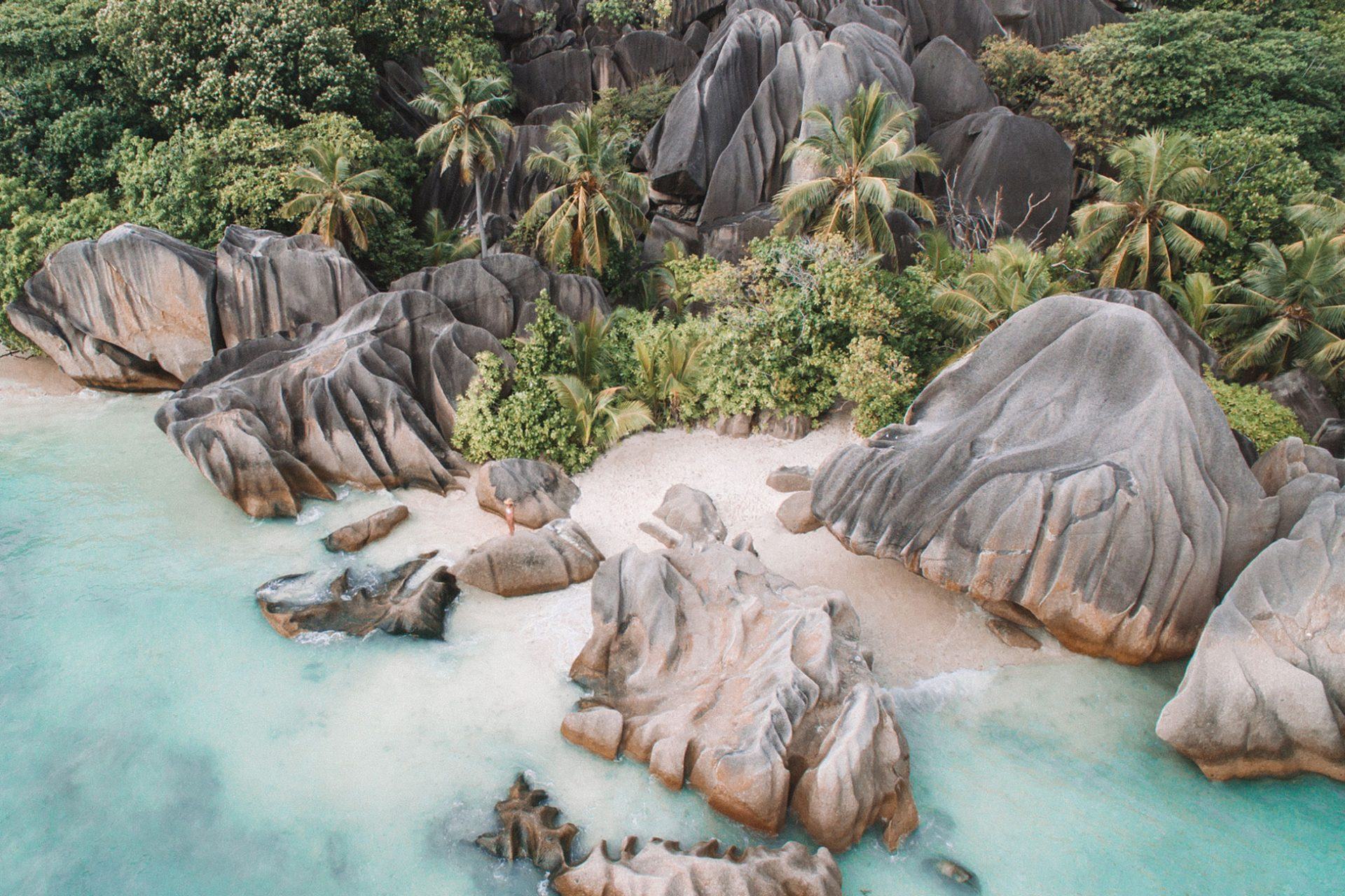 Anse Source d'Argent on La Digue with pink granite boulders and shallow turquoise water