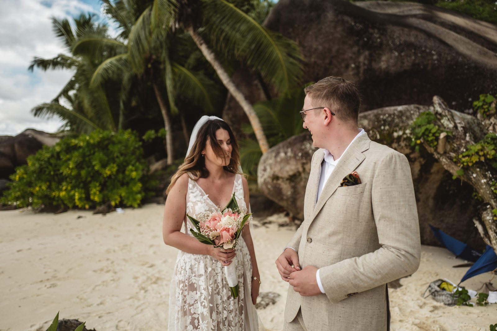 The newlyweds walking the resort gardens at Hilton Labriz, Silhouette
