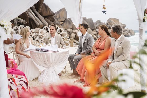 A beach wedding ceremony on La Digue