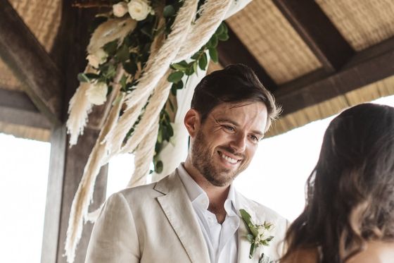 A beach wedding ceremony on Félicité