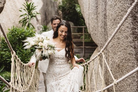 A beach wedding ceremony on Félicité