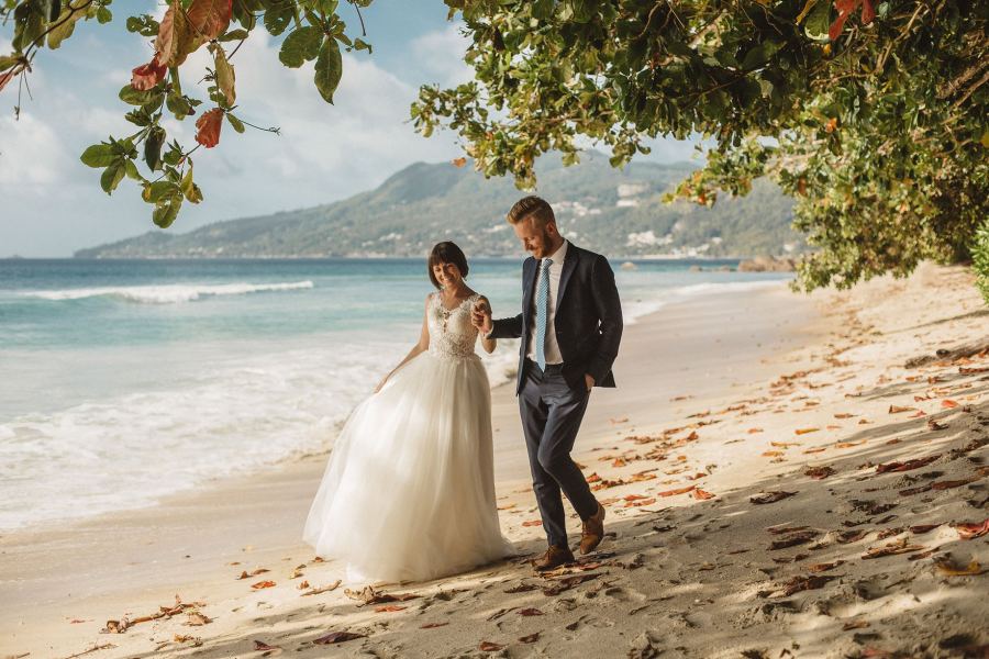 Bride and groom on a Seychelles beach